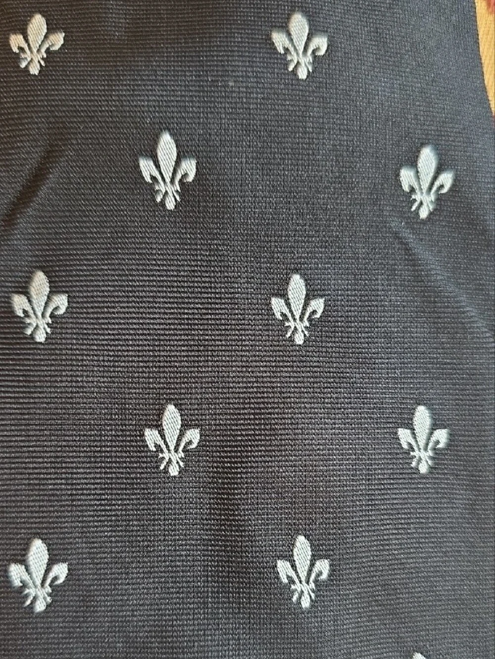 Classic Black Men's Tie with White Fleur-de-Lis Pattern